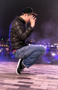 Keith practices his locks & splits alone at midnight at Kwun Tong promenade.